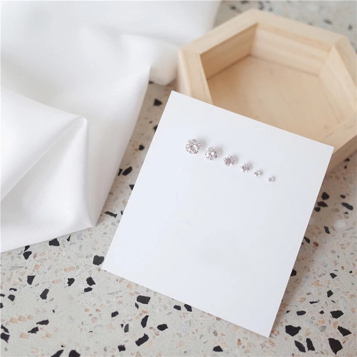 S999 Sterling Silver Four-Claw Stud Earrings – Simple Unisex Anti-blocking Design-SH-FJ-010